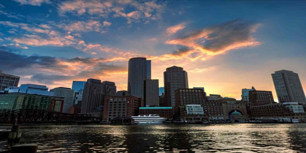 Night shot of a boston skyline from the water
