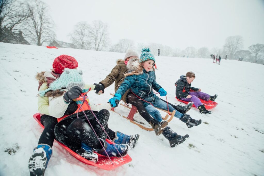 Boston family Sledding