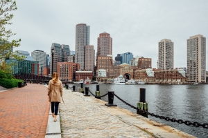 Girl Walking in Seaport Harborwalk Boston