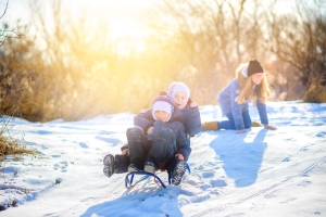 Children Playing in A Snowy Winter Park in January